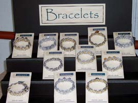 "Bracelets with a Conscience", made from pull tabs, were crafted by  Ann Skydell Harmon of "Ann-Made, LLC". 